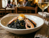 Tagliolini al Nero di Seppia, Scampi e Stracciatella